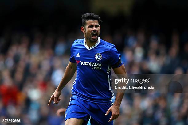 Diego Costa of Chelsea celebrates scoring his team's first goal during the Premier League match between Manchester City and Chelsea at Etihad Stadium...