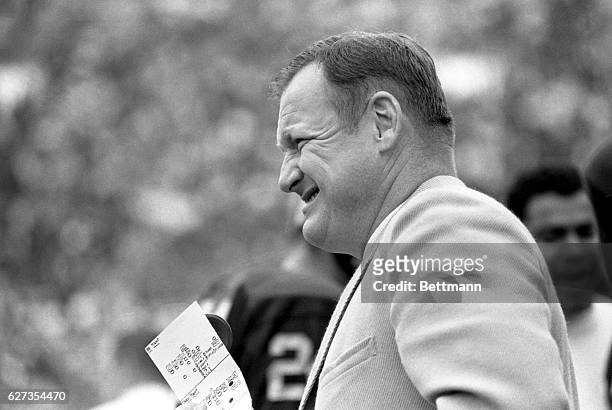 Michigan Football coach Glenn "Bo" Schembechler on the sidelines during game.