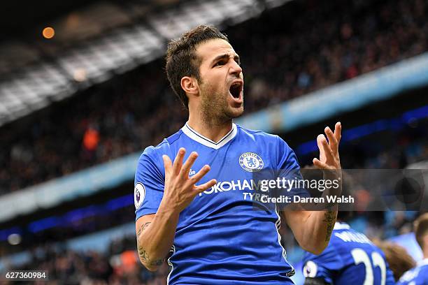 Cesc Fabregas of Chelsea celebrates his team's third goal scored by Eden Hazard during the Premier League match between Manchester City and Chelsea...