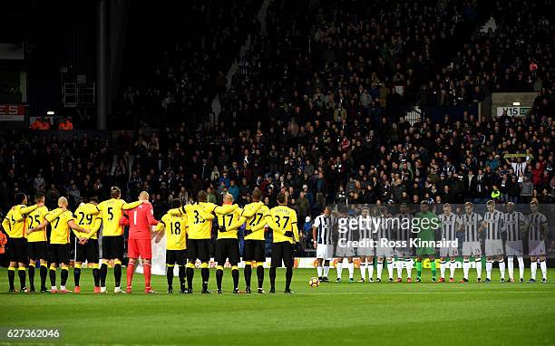 The players observe a minute's silence for the victims of the plane crash involving the Brazilian club Chapecoense prior to the Premier League match...