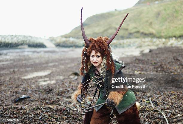 Sarah Steele from Whitby dresses as the folklore figure, Krampus, ahead of a charity event on December 3, 2016 in Whitby, United Kingdom. The Krampus...