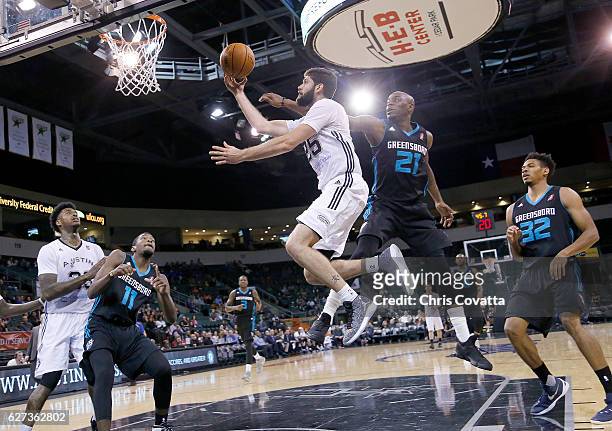 Patricio Garino of the Austin Spurs drives to the basket against the Greensboro Swarm at the HEB Center At Cedar Park on December 2, 2016 in Cedar...