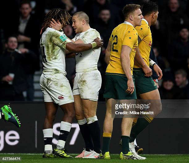 Marland Yarde of England celebrates scoring his sides second try with Mike Brown of England during the Old Mutual Wealth Series match between England...