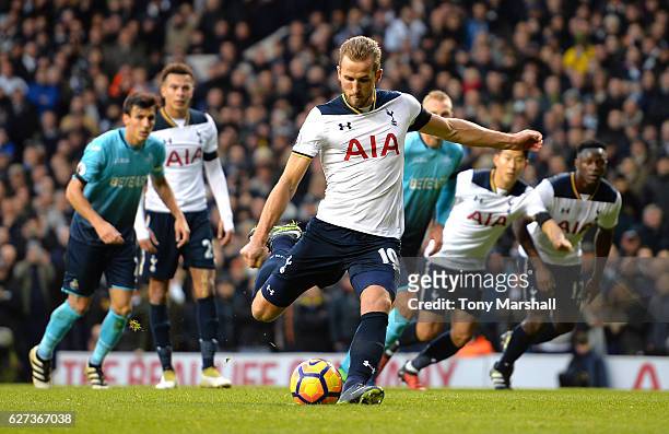 Harry Kane of Tottenham Hotspur converts the penalty to score the opening goal during the Premier League match between Tottenham Hotspur and Swansea...