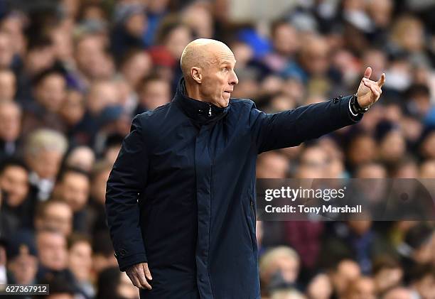 Bob Bradley, Manager of Swansea City gestures during the Premier League match between Tottenham Hotspur and Swansea City at White Hart Lane on...