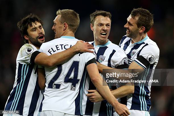 Jonny Evans of West Bromwich Albion celebrates scoring the first goal during the Premier League match between West Bromwich Albion and Watford at The...