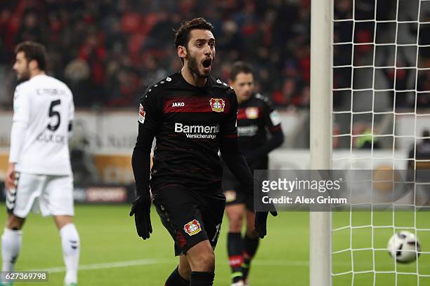 Hakan Calhanoglu of Leverkusen celebrates his team's first goal during the Bundesliga match between Bayer 04 Leverkusen and SC Freiburg at BayArena...