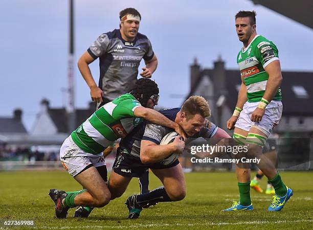 Galway , Ireland - 3 December 2016; Tom McCartney of Connacht scores his side's third try despite the tackle of Ian McKinley of Treviso during the...