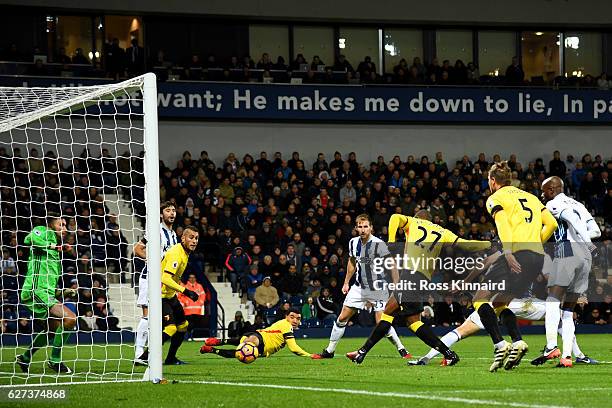 Christian Kabasele of Watford scores his team's first goal during the Premier League match between West Bromwich Albion and Watford at The Hawthorns...