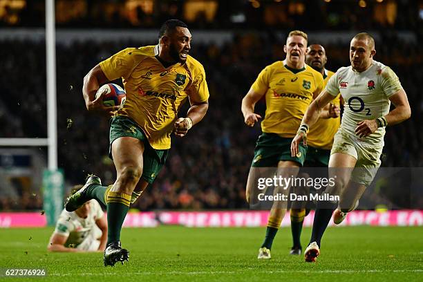 Sekope Kepu of Australia scores his sides second try during the Old Mutual Wealth Series match between England and Australia at Twickenham Stadium on...