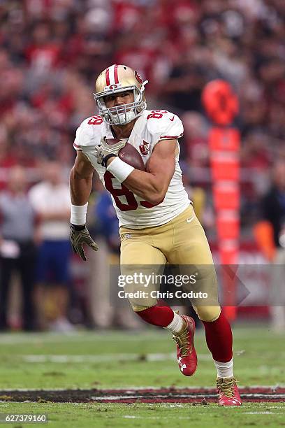 Tight end Vance McDonald of the San Francisco 49ers runs up field during the first half of the NFL football game against the Arizona Cardinals at...