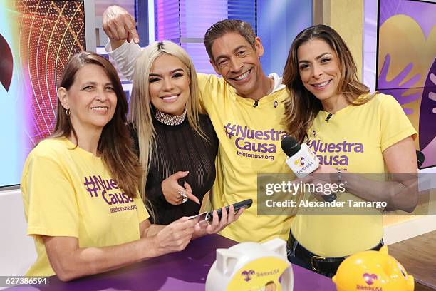 Musician Karol G, Johnny Lozada, Lourdes Stephen are seen during Univision's Teleton 2016 at Univision Studios on December 3, 2016 in Miami, Florida.