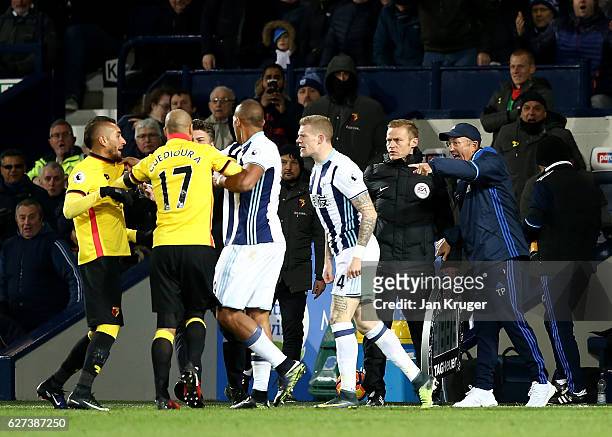 Tony Pulis manager of West Bromwich Albion reacts as Roberto Pereyra of Watford and James McClean of West Bromwich Albion clash during the Premier...