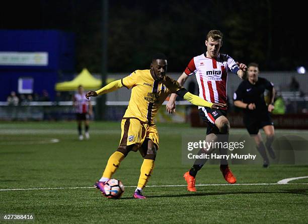 Roarie Deacon of Sutton United scores his teams winning goal during The Emirates FA Cup Second Round between Sutton United and Cheltenham Town on...