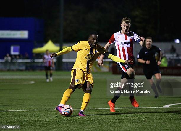 Roarie Deacon of Sutton United scores his teams winning goal during The Emirates FA Cup Second Round between Sutton United and Cheltenham Town on...