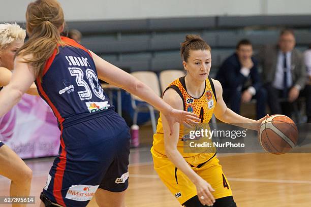 Olha Dubrovina of the Astana Tigers in action against Carolyn Swords of the Basket Gdynia during Eastern European Womens Basketball League Group B...