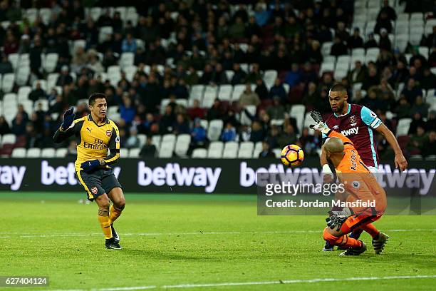 Alexis Sanchez of Arsenal beats goalkeeper Darren Randolph of West Ham United as he scores his team's fifth goal and completes his hat trick during...