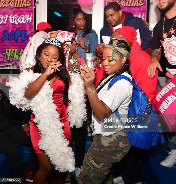 Reginae Carter, Lil Wayne, Antonia 'Toya' Wright on December 2, 2016 in Atlanta, Georgia.