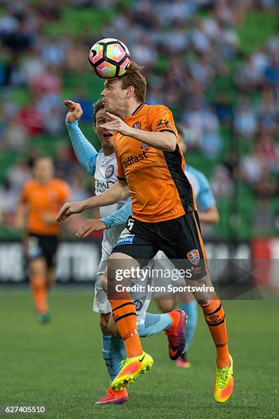 Corey Brown of the Brisbane Roar heads the ball during the 9th round of the Hyundai A-League between Melbourne City and the Brisbane Roar on December...