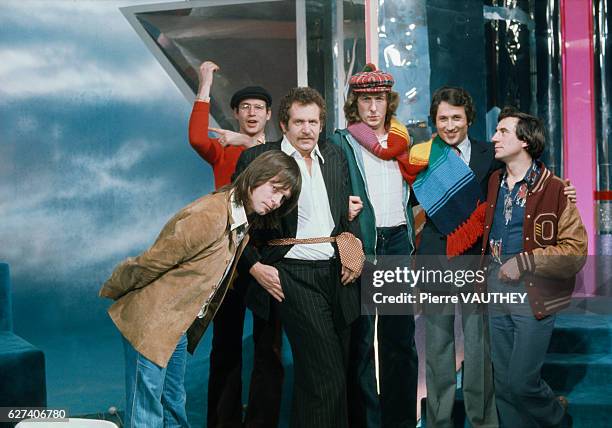 Comedians from the British comedy troupe Monty Python join musician and composer Mort Shuman and French TV host Michel Drucker on the set of...