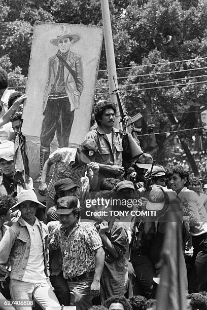 Sandinista guerillas arrive triomphant in the Nicaraguan capital of Managua following the resignation and expropriation of Dictator Anastasio Somoza.