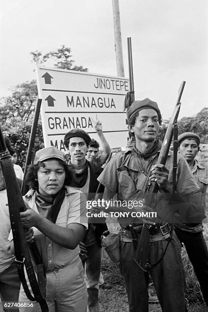 Sandinista guerrillas arrive triomphant in the Nicaraguan capital of Managua following the resignation and expropriation of Dictator Anastasio Somoza.