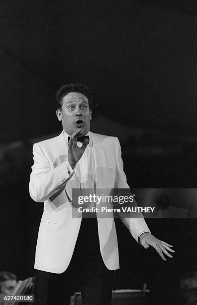 Russian opera singer Evgeny Nesterenko performs at a benefit concert to aid people suffering from starvation in Ethiopia. Other performers included...