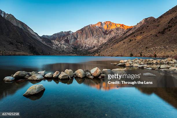 convict lake during sunrise - mammoth lakes stock pictures, royalty-free photos & images
