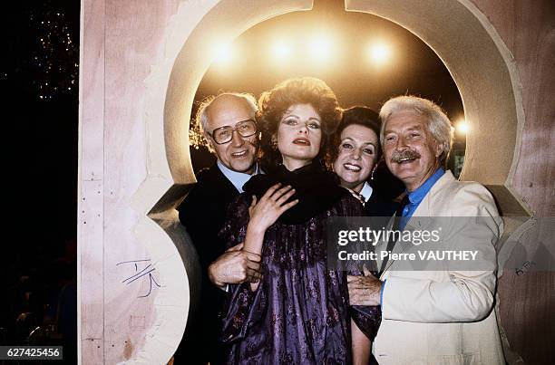 French fashion designer Jules-Francois Crahay poses with fashion model Olga Rostropovich and her parents, cellist Mstislav Rostropovich and singer...