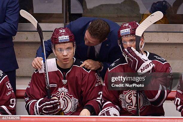 Head coach of Dinamo Riga Sejejs Normunds gives hints to Edgars Kulda during the game between Dinamo Riga and Metallurg Magnitogorsk at Tondiraba Ice...