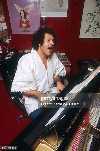 American singer and songwriter Mort Shuman sings and plays the piano at his home in Neuilly. Along with cowriter Doc Pomus, Shuman wrote over 500...