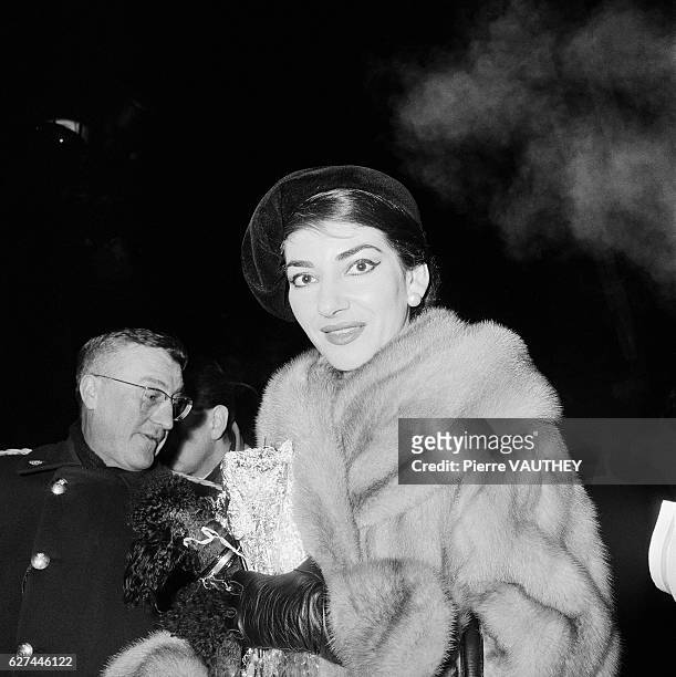 Opera singer Maria Callas visits Paris with her husband, Italian industrialist Giovanni Battista Meneghini .