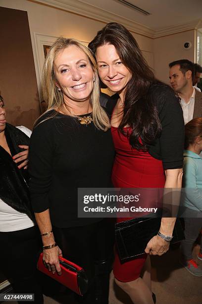 Catherine Carey and Paige Boller attend If You Give a Mouse a Maltese Cross Holiday Party at Verdura Showroom on December 3, 2016 in New York City.