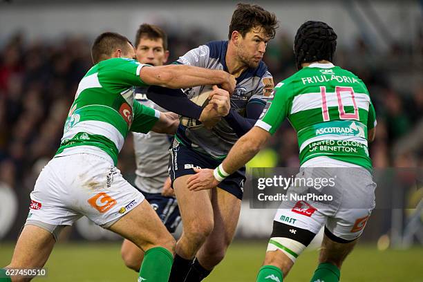 Danie Poolman of Connacht tackled by Ian McKinley and Alberto Sgarbi of Benetton during the Guinness PRO12 Round 10 match between Connacht Rugby and...