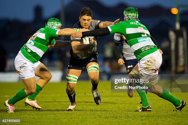 Quinn Roux of Connacht tackled by Luca Bigi and Marco Fuser of Benetton during the Guinness PRO12 Round 10 match between Connacht Rugby and Benetton...