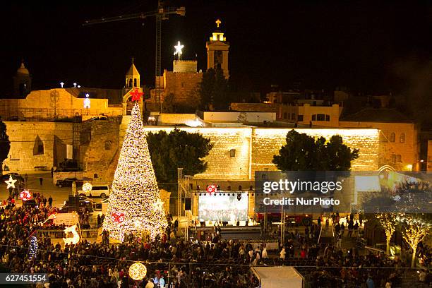 Hundreds of Palestinians involved in the Christmas tree lighting ceremony downtown Bethlehem, West Bank, on 3 December 2016 in preparation for the...