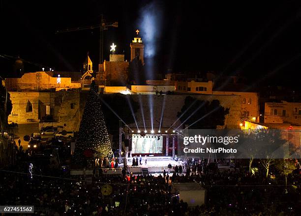 Hundreds of Palestinians involved in the Christmas tree lighting ceremony downtown Bethlehem, West Bank, on 3 December 2016 in preparation for the...