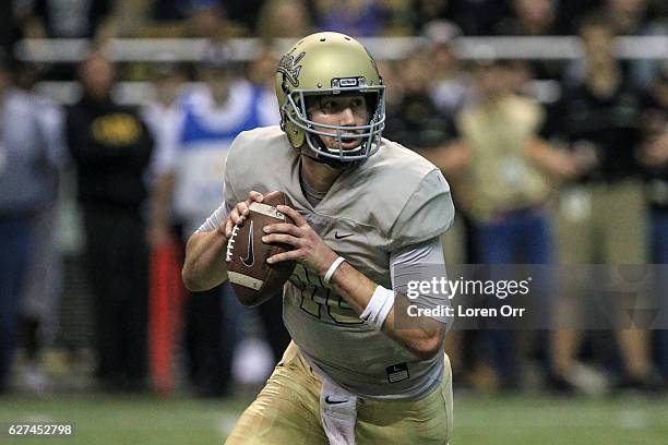 Quarterback Matt Linehan of the Idaho Vandals looks to pass down field during first half action between the Georgia State Panthers on December 3,...
