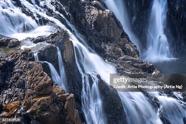 close view of the barron falls, atherton tablelands, cairns, tropical north queensland, australia - north queensland stock pictures, royalty-free photos & images