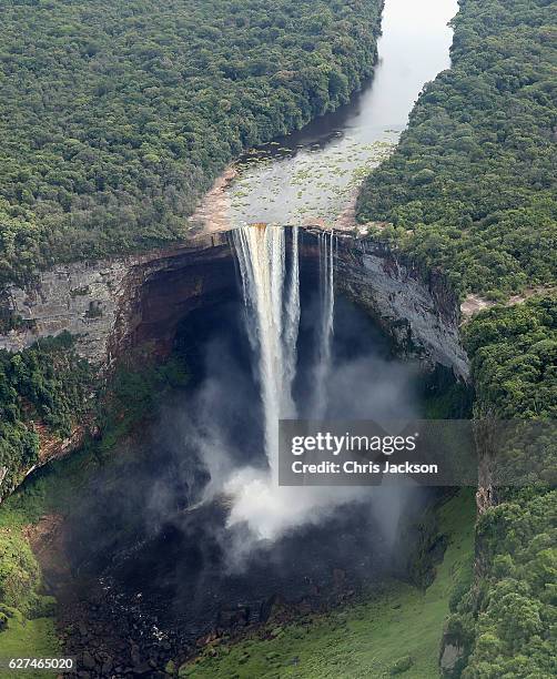 Pilot flies over the iconic Kaieteur Falls in the Guyana Hinterland on day 13 of an official visit to the Caribbean on December 3, 2016 in Surama,...