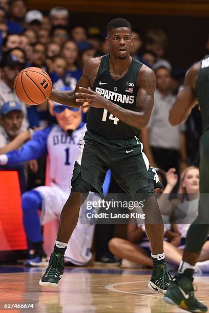 Eron Harris of the Michigan State Spartans moves the ball against the Duke Blue Devils at Cameron Indoor Stadium on November 29, 2016 in Durham,...