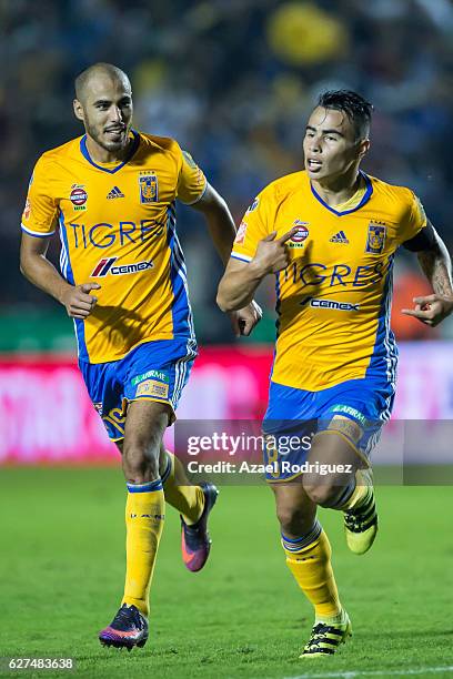 Lucas Zelarayan of Tigres celebrates with teammate Guido Pizarro after scoring his team's second goal during the semifinals second leg match between...