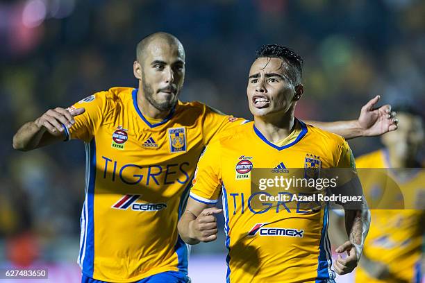 Lucas Zelarayan of Tigres celebrates with teammate Guido Pizarro after scoring his team's second goal during the semifinals second leg match between...