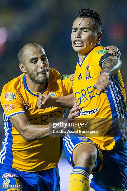 Lucas Zelarayan of Tigres celebrates with teammate Guido Pizarro after scoring his team's second goal during the semifinals second leg match between...