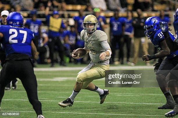 Quarterback Matt Linehan of the Idaho Vandals scrambles during second half action against the Georgia State Panthers on December 3, 2016 at the...