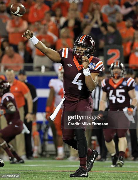 Jerod Evans of the Virginia Tech Hokies passes during the ACC Championship against the Clemson Tigers on December 3, 2016 in Orlando, Florida.