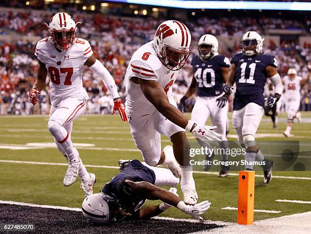 Corey Clement of the Wisconsin Badgers scores a touchdown in the first quarter of the Big Ten Championship against the Penn State Nittany Lions at...