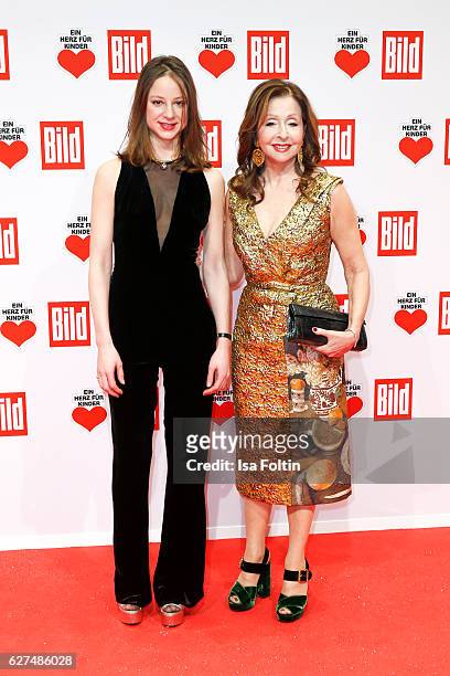 German actress Sandra von Ruffin and her mother singer Vicky Leandros attend the Ein Herz Fuer Kinder gala on December 3, 2016 in Berlin, Germany.
