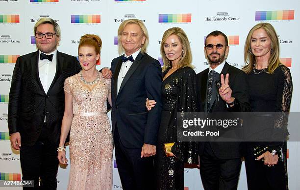 Joe Walsh of the rock band "The Eagles" and his wife, Marjorie, arrive for the formal Artist's Dinner honoring the recipients of the 39th Annual...