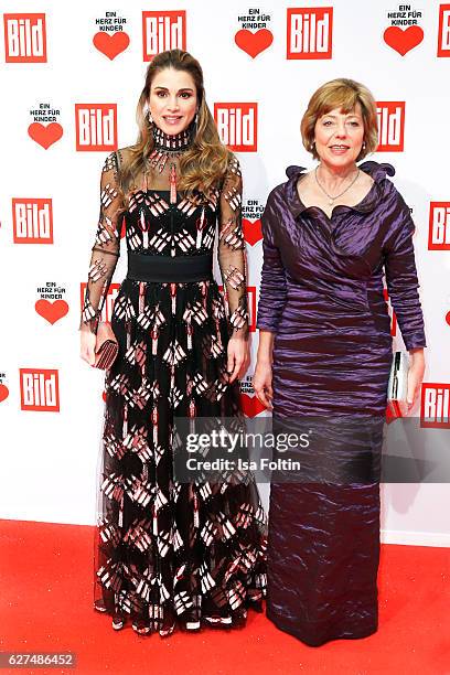 Queen Rania Al-Abdullah of Jordan and Daniela Schadt, girlfriend of the federal president of Germany attend the Ein Herz Fuer Kinder gala on December...